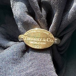 Tiffany and Co. Oval Tag Ring (retired). Size 6.0 in excellent condition.